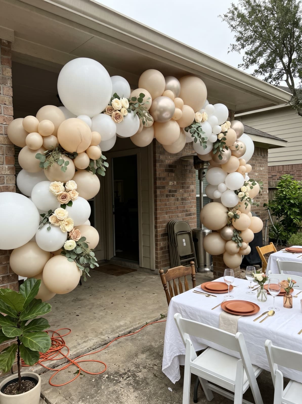 Floral balloon arch with greenery for a bridal shower
