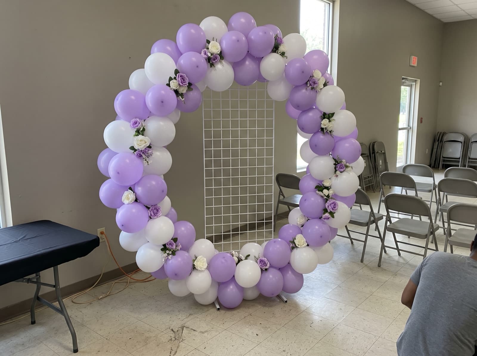 Round balloon arch framing a photo spot