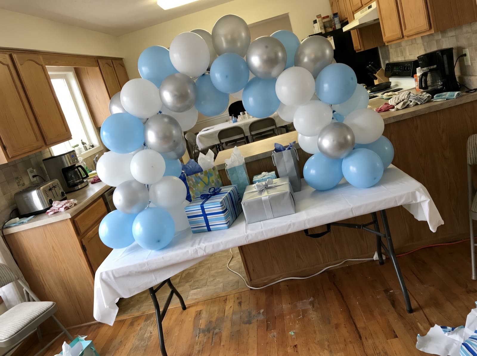 Mini tabletop balloon arch over a gift table